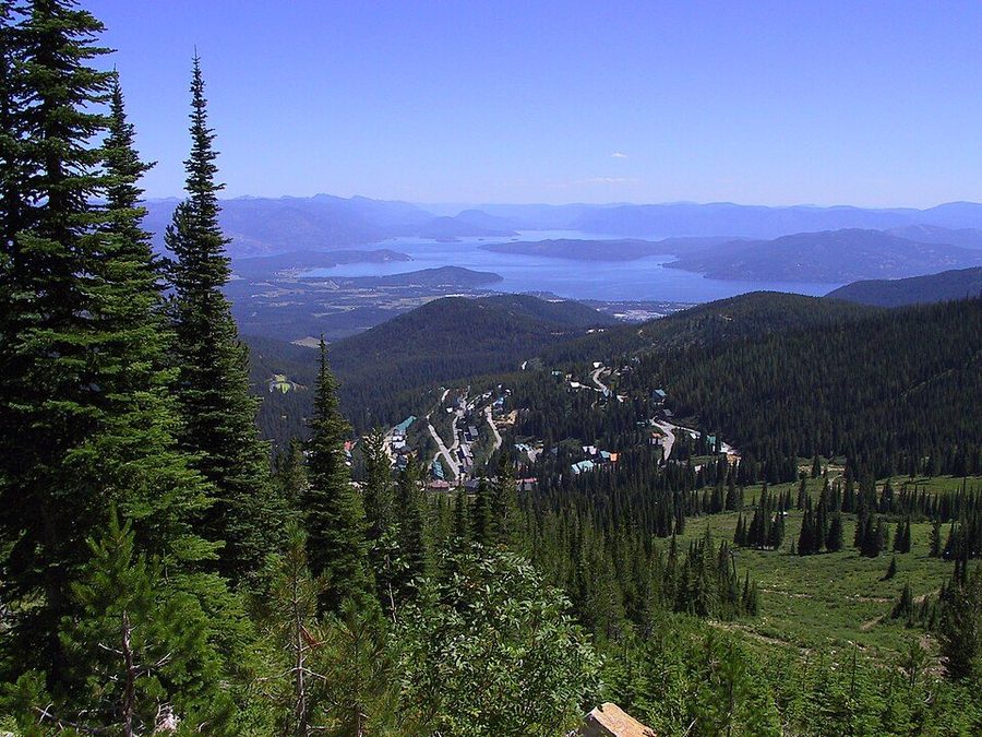 Sandpoint, Idaho seen from Schweitzer Mountain — the town on the edge of Lake Pend Oreille with mountains beyond.
