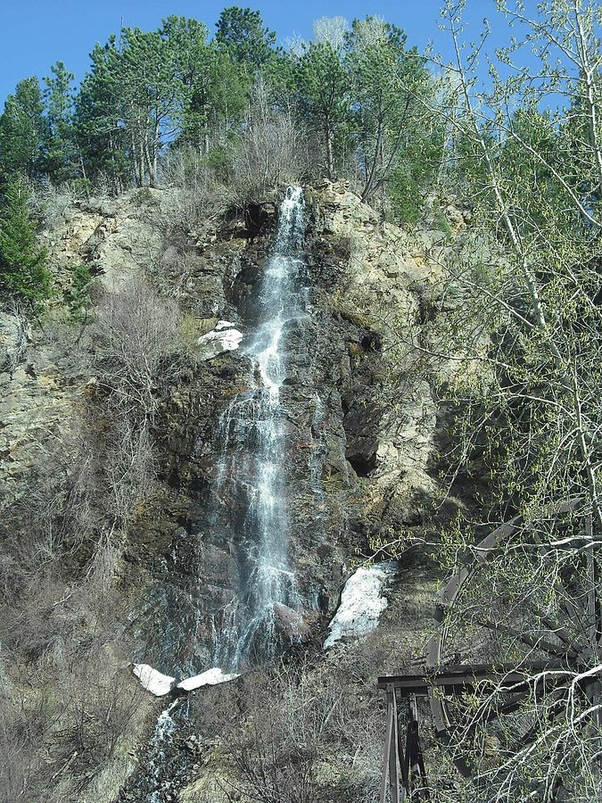 Spring snowmelt running down a rocky mountainside.